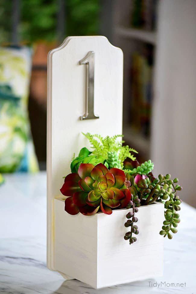 Increase your curb appeal with an address planter box. This DIY house number is super simple and quick to make and doesn’t require any tools. Get the full tutorial at cetcu.com