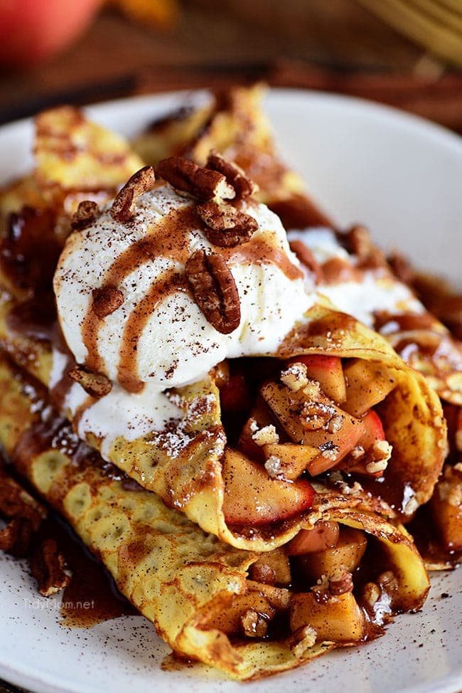 These apple pie crepes make the perfect treat anytime of the day. Top them with vanilla ice cream for dessert crepes that everyone will be talking about! Get the easy recipe at cetcu.com #crepes #apple #applepie #appledessert