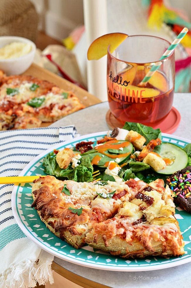 Girls Night Pizza Party! Customize a DIGIORNO Originial Rising Crust Four Cheese with your own toppings, like this Grilled Artichoke, Chicken and Sun-Dried Tomato Pizza with parmesan cheese. While the pizza bakes for about 20 minutes, set up a salad bar! Details at cetcu.com