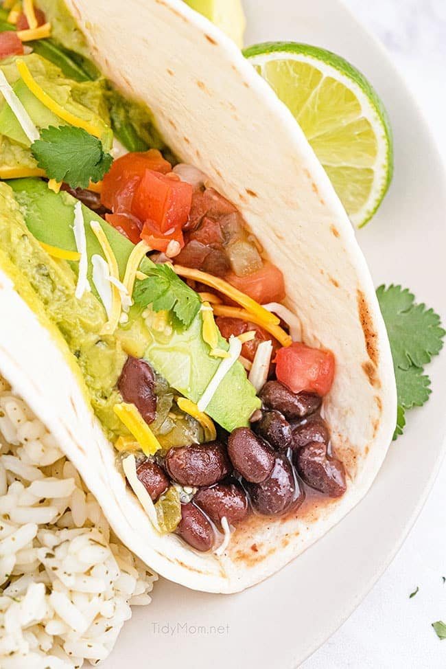 avocado taco with a side of lime rice