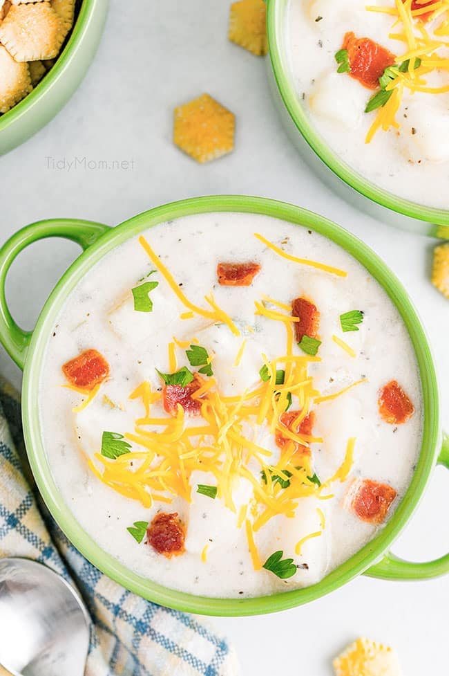 Homemade creamy bacon potato soup in a green bowl