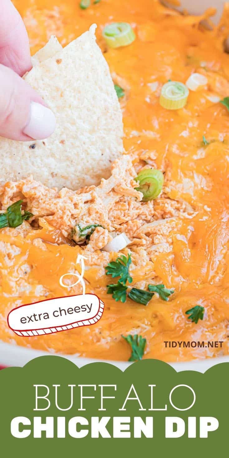 close up of cheesy buffalo chicken dip on a chip