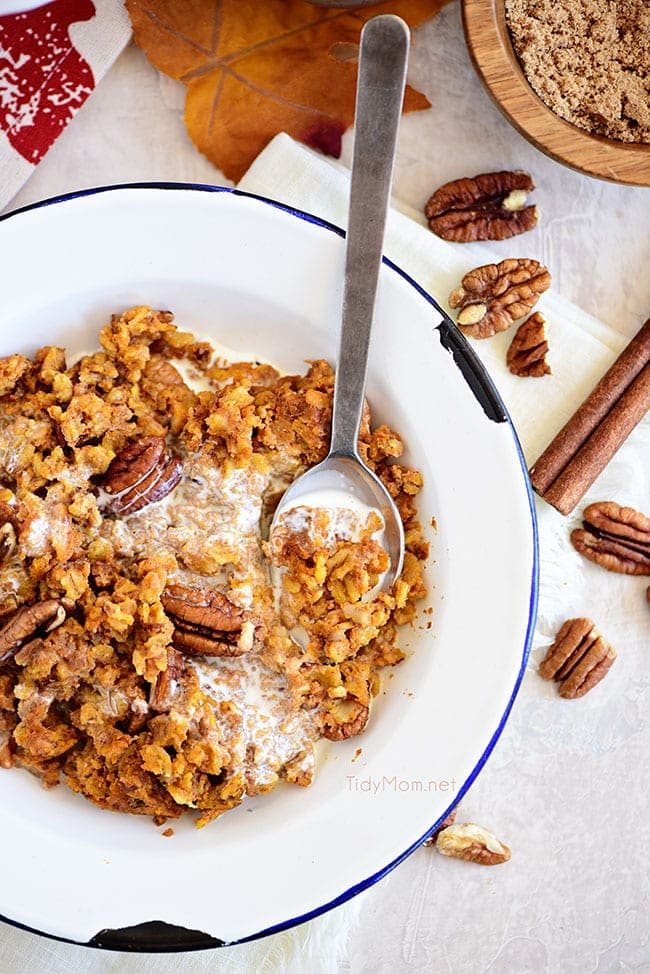 baked pumpkin oatmeal in a bowl with milk