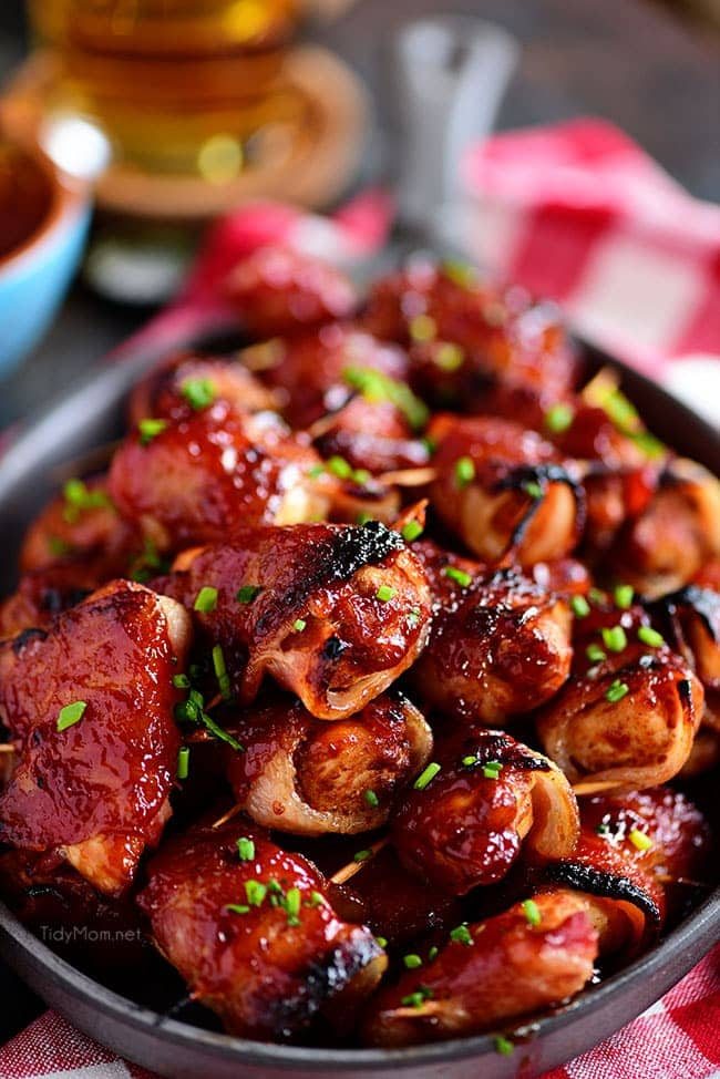 BBQ Bacon Wrapped Chicken Bites stacked on a plate