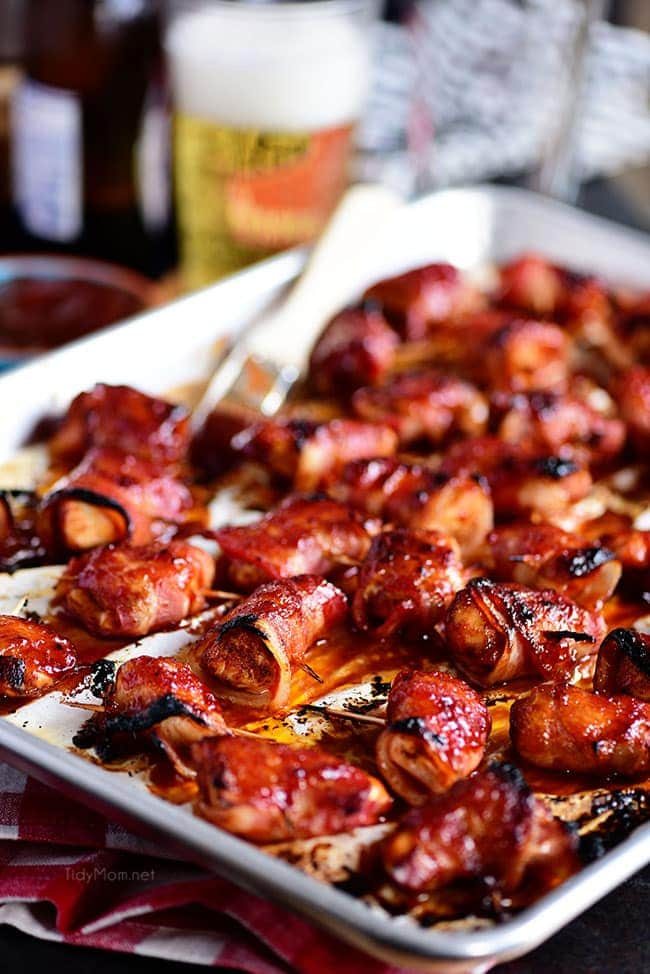BBQ Bacon Wrapped Chicken Bites on parchment lined pan