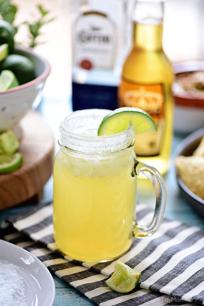 This easy recipe for a Beer Margarita has only 3 ingredients and is dripping with Mexican flavors. The best Beergarita is light, not too sweet, refreshing and super easy, to make! When you combine tequila, beer, and frozen limeade, you have something for the cocktail lover and brewski lover. Perfect for Cinco de Mayo or any celebration! Get this #cocktailrecipe at cetcu.com #margarita #cocktails