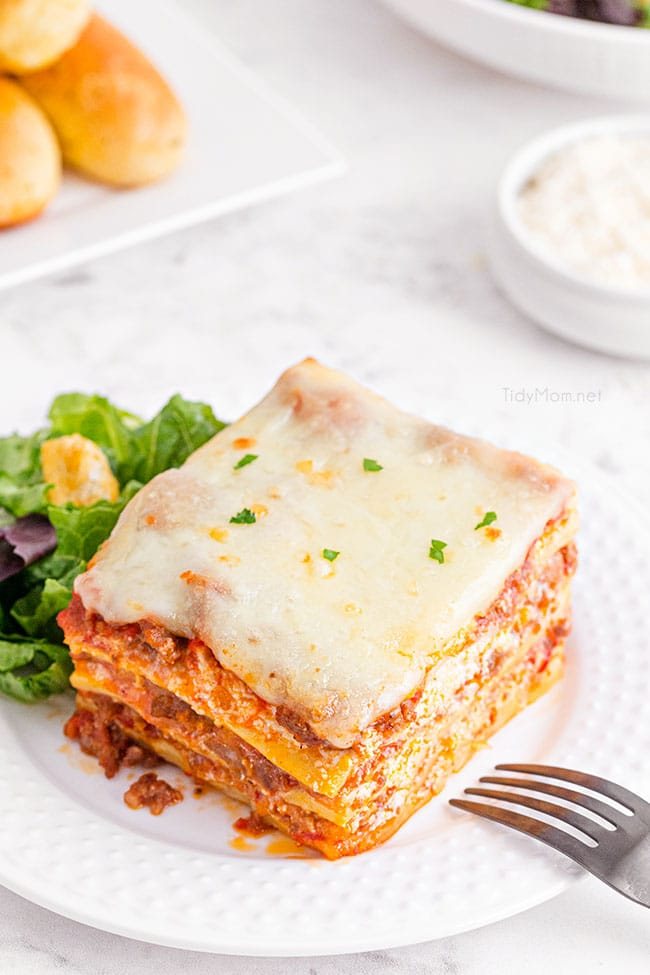 The Best Homemade Lasagna on a white plate