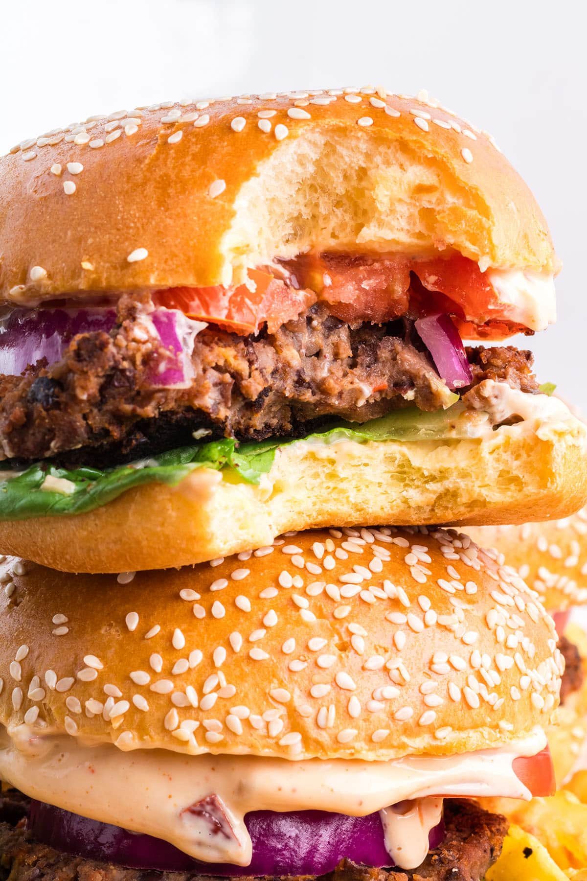 black bean burger with a bite missing