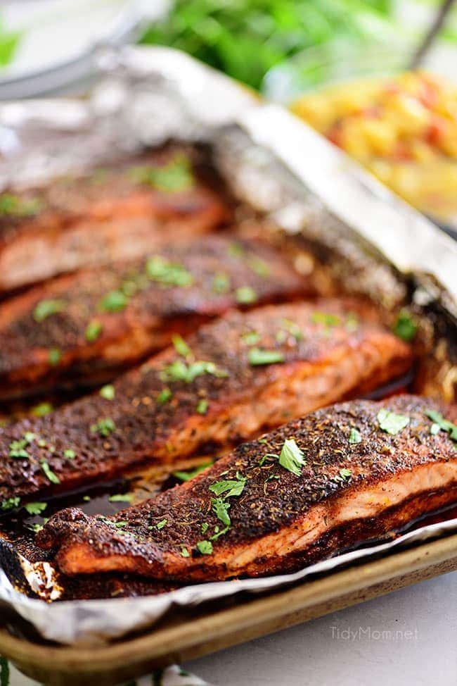 grilled blackened salmon on a pan