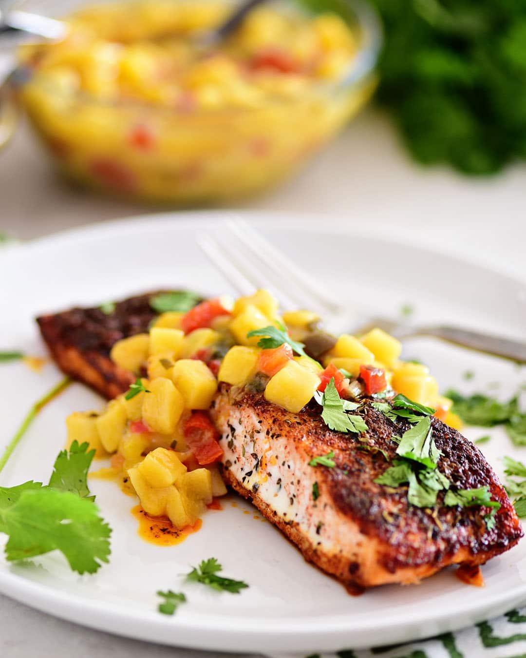 grilled blackened salmon topped with mango salsa