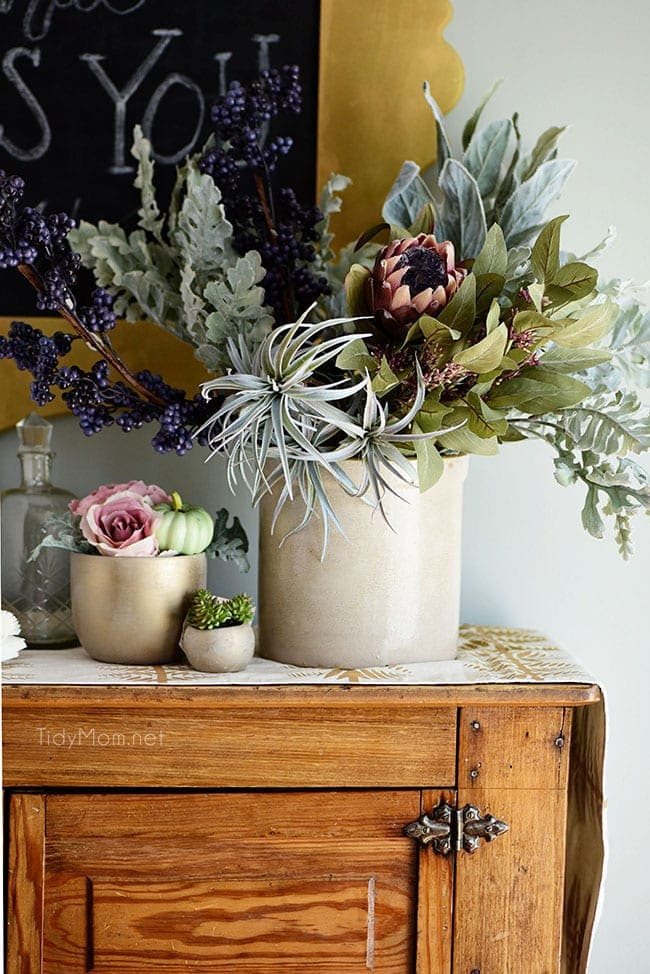 Seasonal Simplicity — Blue and Green Fall Tablescape and centerpiece with a touch of pink . Get all the details along with 20+ Fall Home Tours at cetcu.com