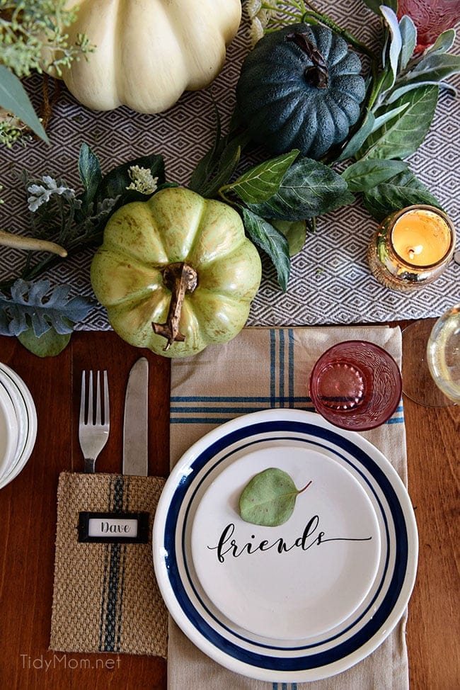 Friends Plate and Pumpkin: Seasonal Simplicity — Blue and Green Fall Tablescape with simple eucalyptus and pumpkins fall centerpiece . Get all the details along with 20+ Fall Home Tours at cetcu.com