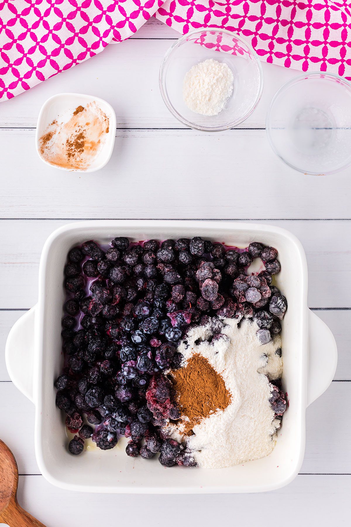 mixing a berry crisp right in the pan