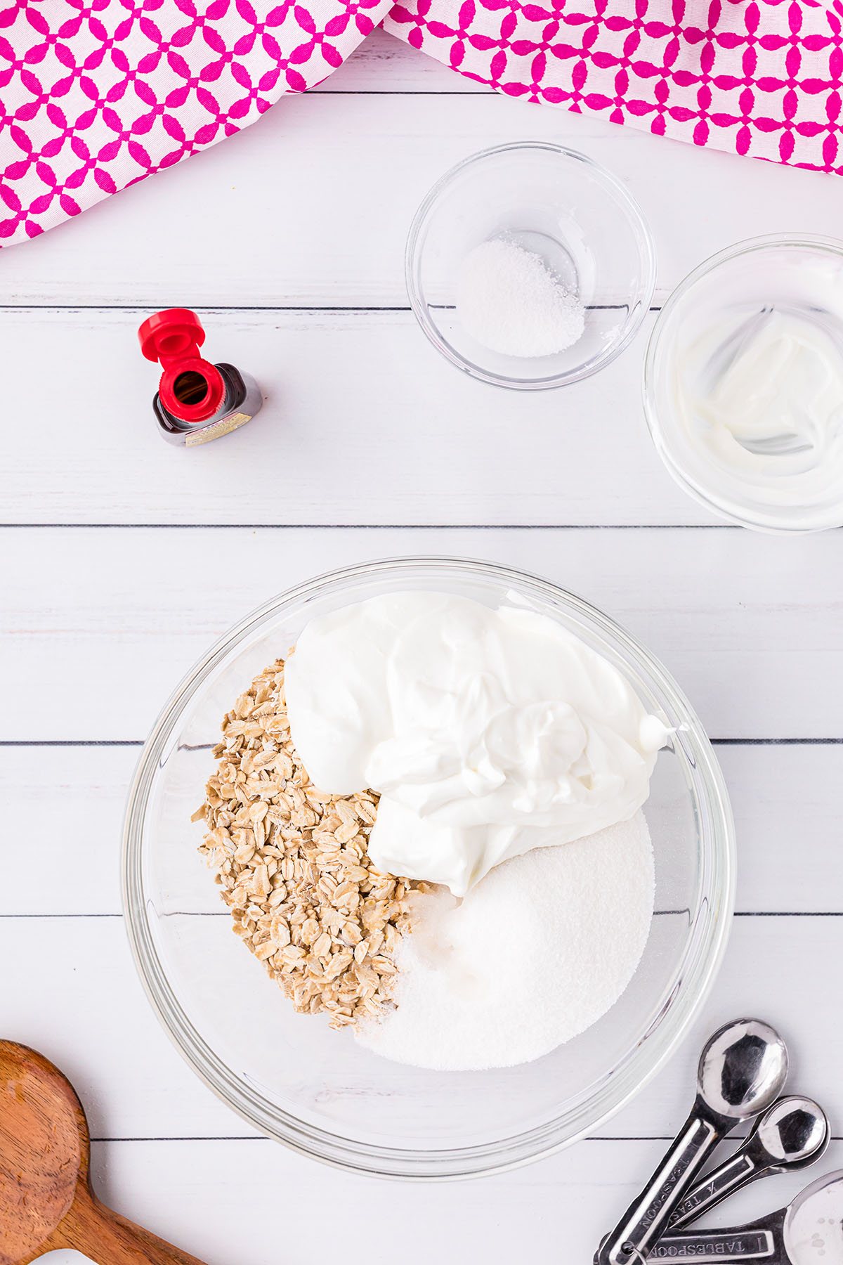 berry crisp topping with oats in a glass mixing bowl