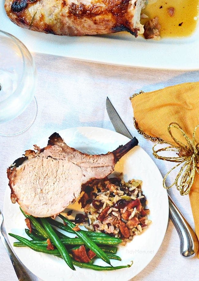 brined rack of pork serving on a plate