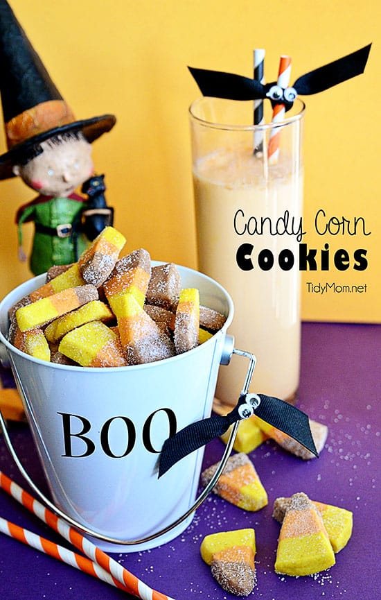 fall cookies in bucket with glass or orange milk