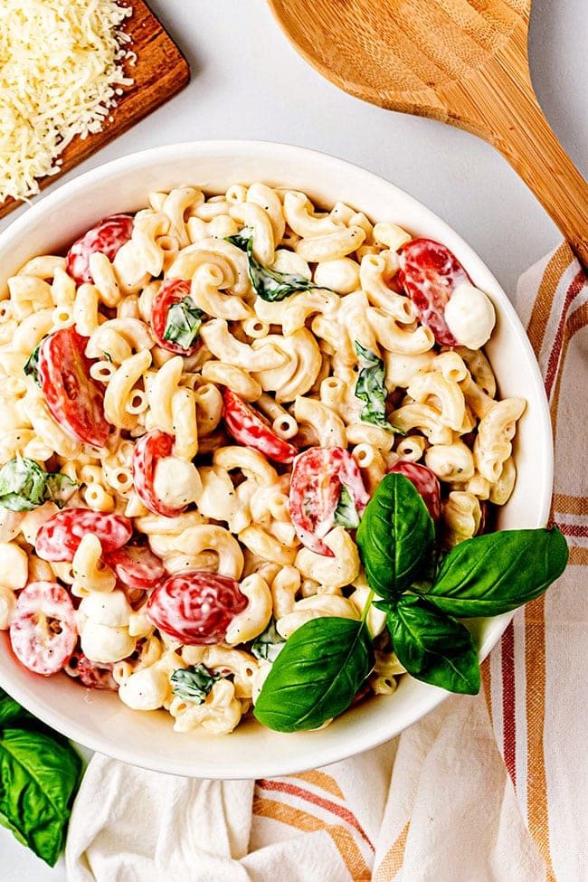 Creamy Caprese Macaroni Salad with fresh basil