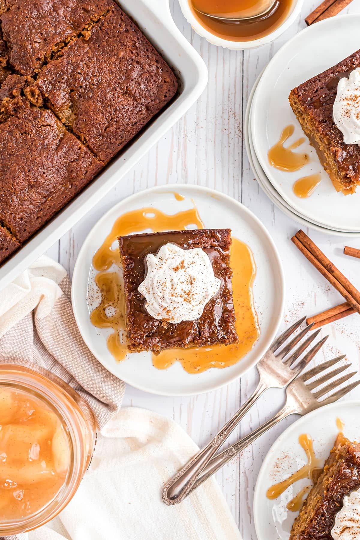 overhead shot of apple gingerbread cake with caramel sauce.
