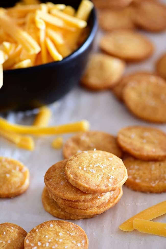 spicy cheddar cheese savory shortbread stacked on a pan