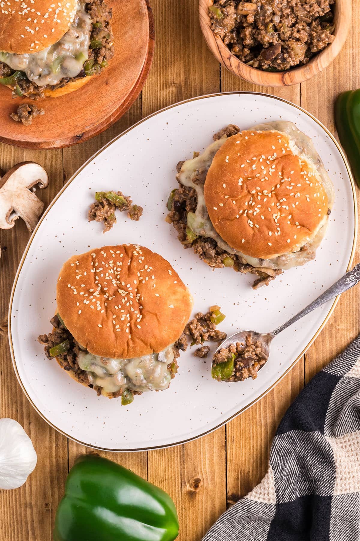 cheesesteak sloppy joe sandwiches on a platter