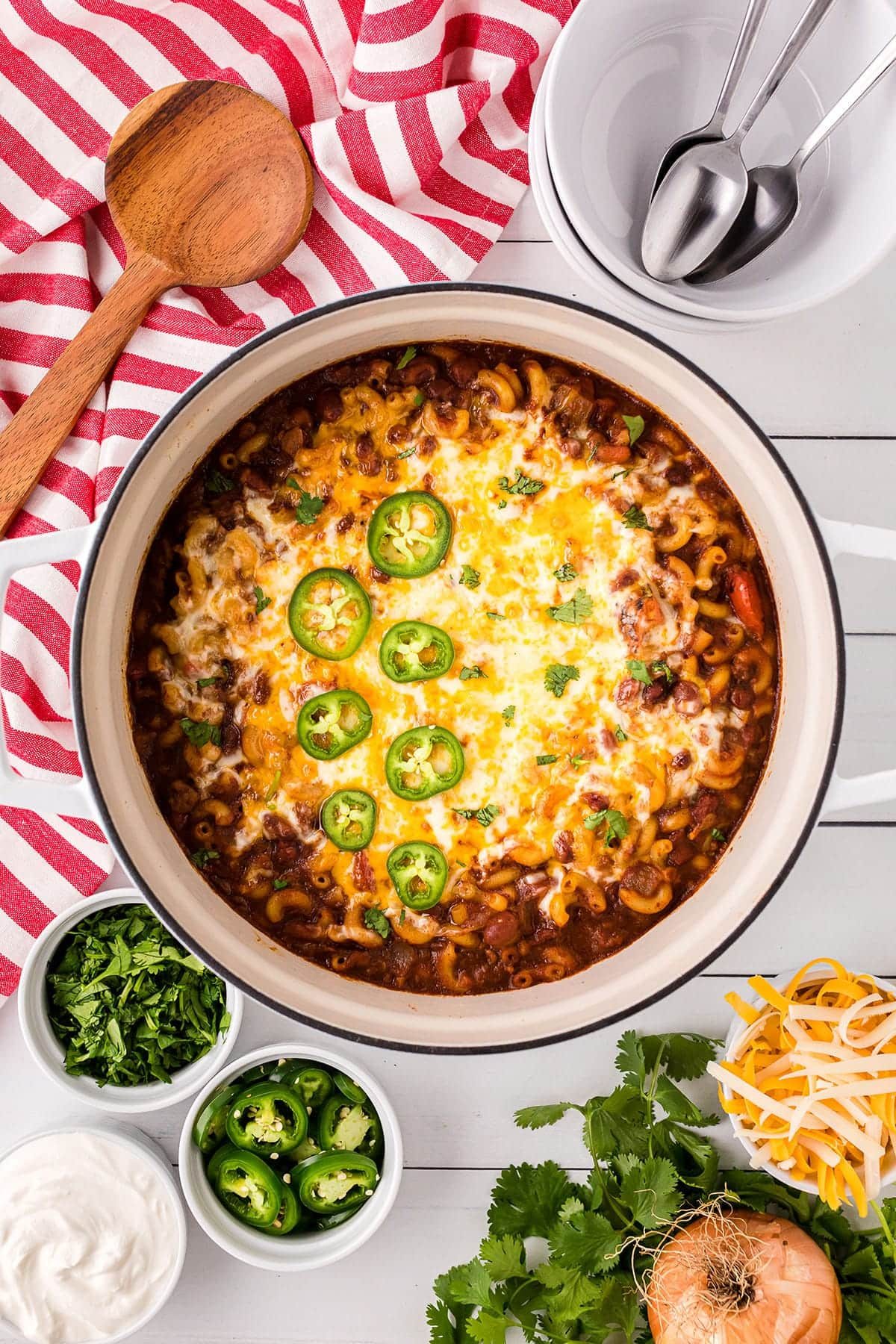 pot of chili with melted cheese on top