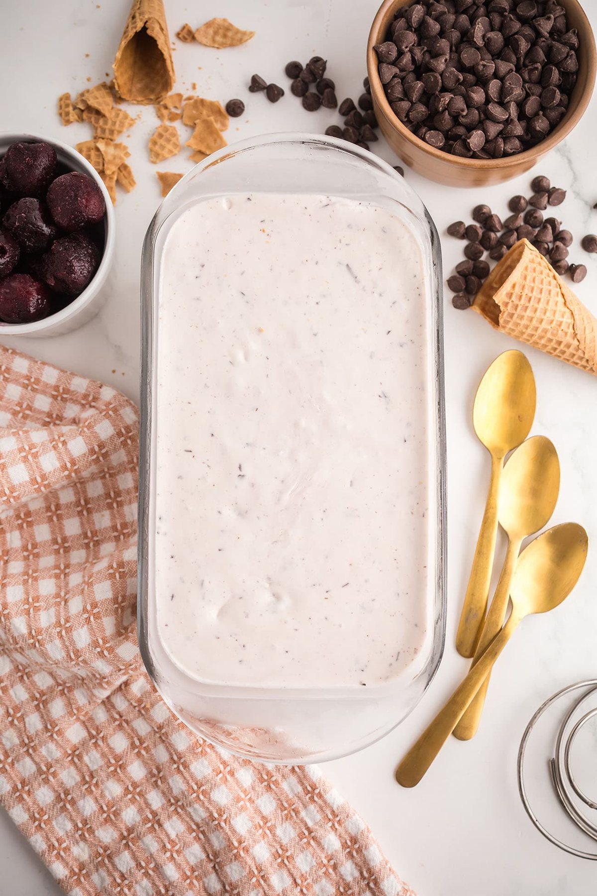 Cherry Garcia ice cream mixture in loaf pan ready to freeze
