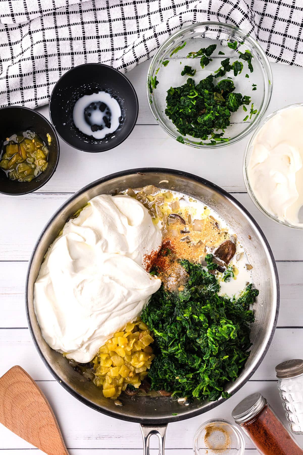 making creamy white sauce for enchilada casserole