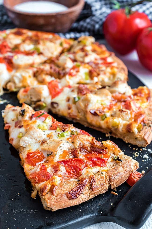 homemade chicken bacon ranch pizza on a pizza pan