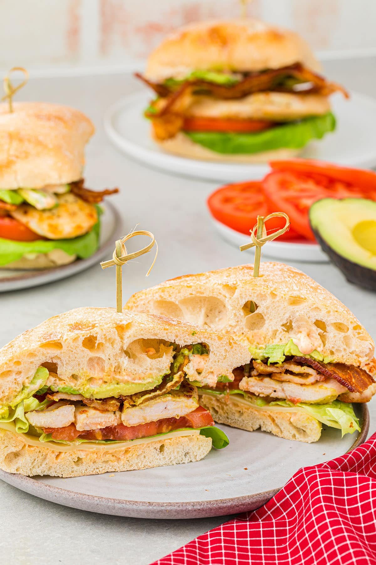 Chicken Club Sandwich on cibatta rolls cut in half