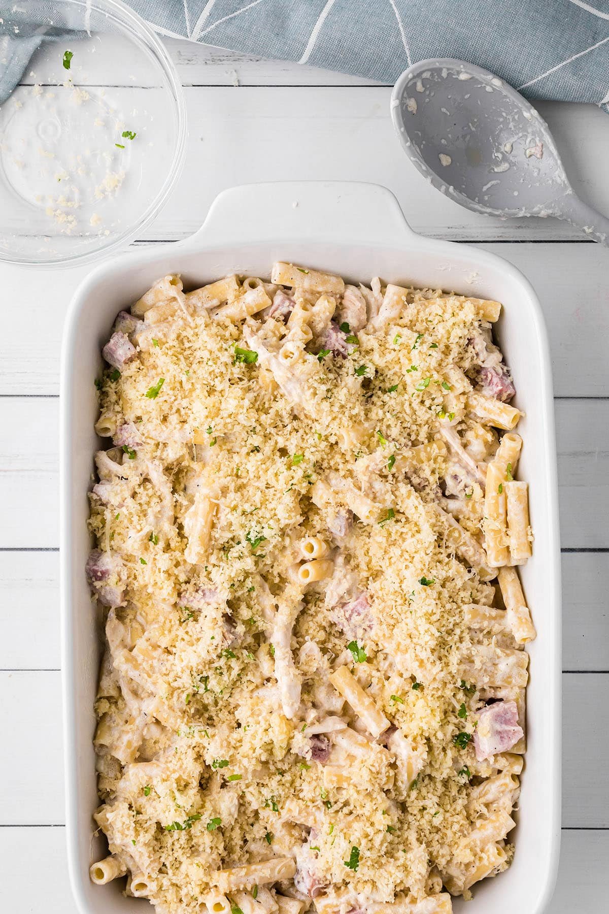 unbaked casserole in a white baking dish