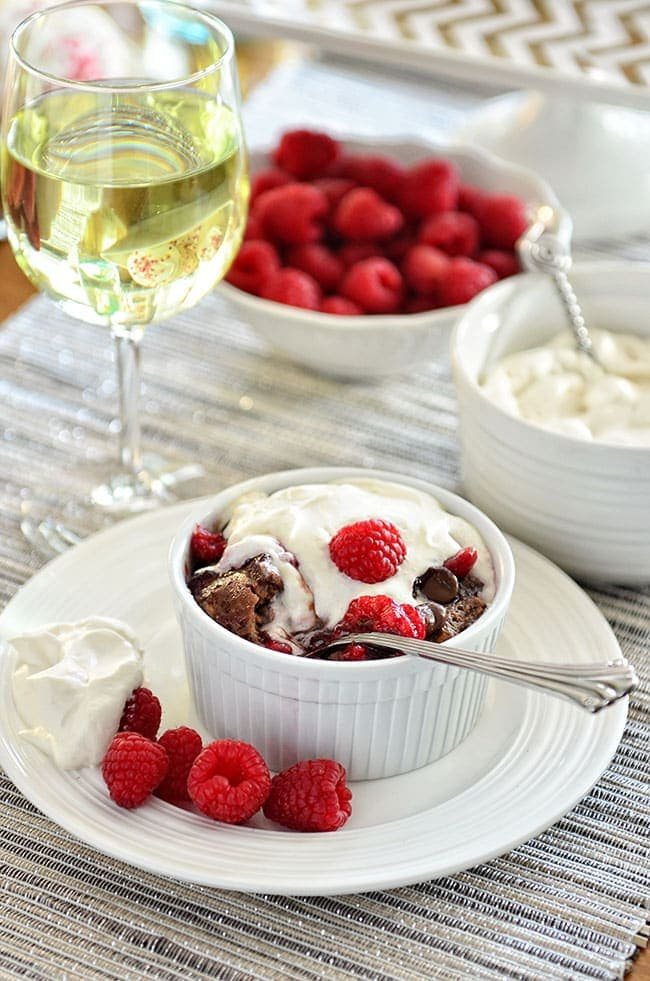 Dark Chocolate Bread Pudding with raspberry sauce and Bailey's Whipped Cream recipe at cetcu.com