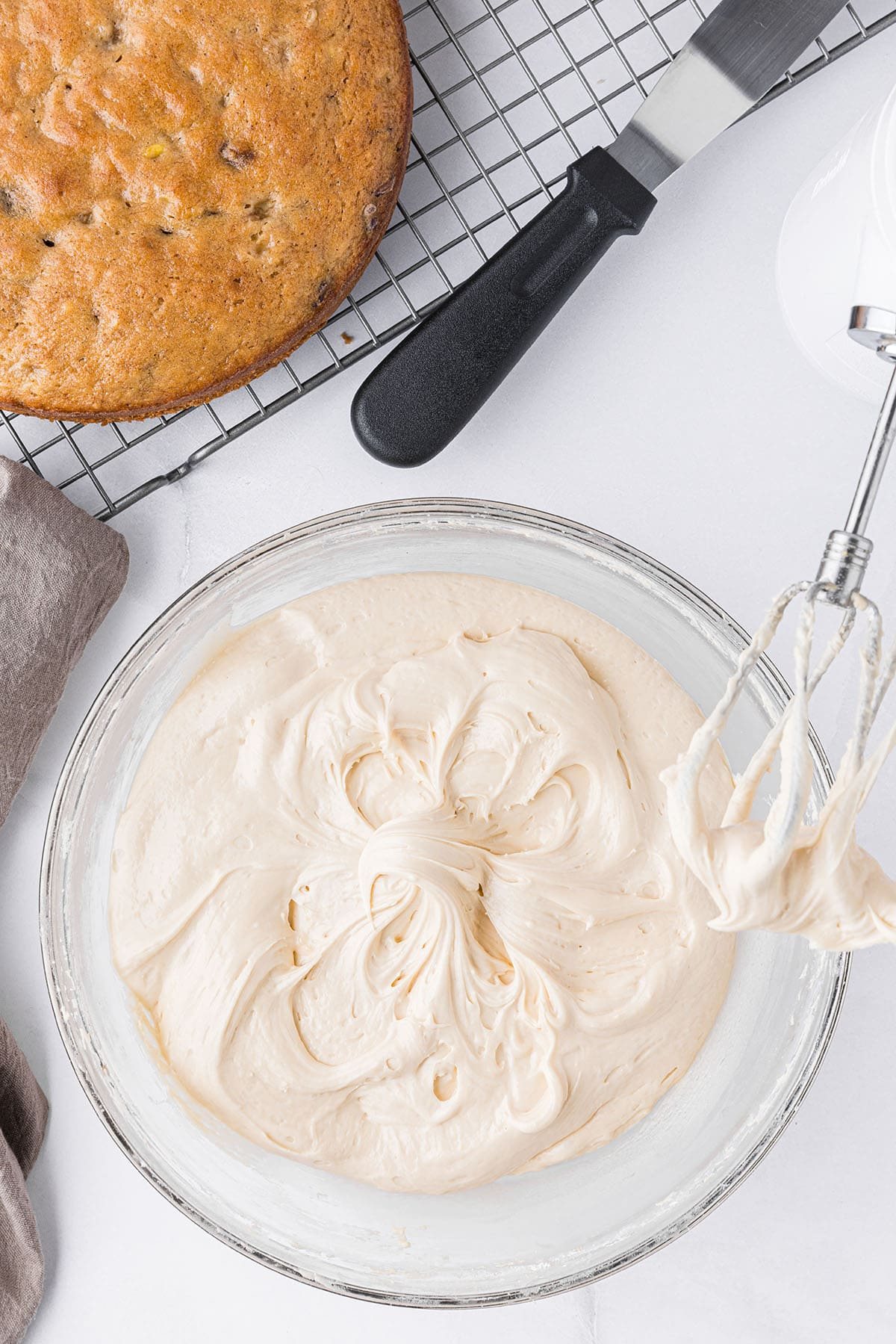 salted caramel frosting in a glass mixing bowl