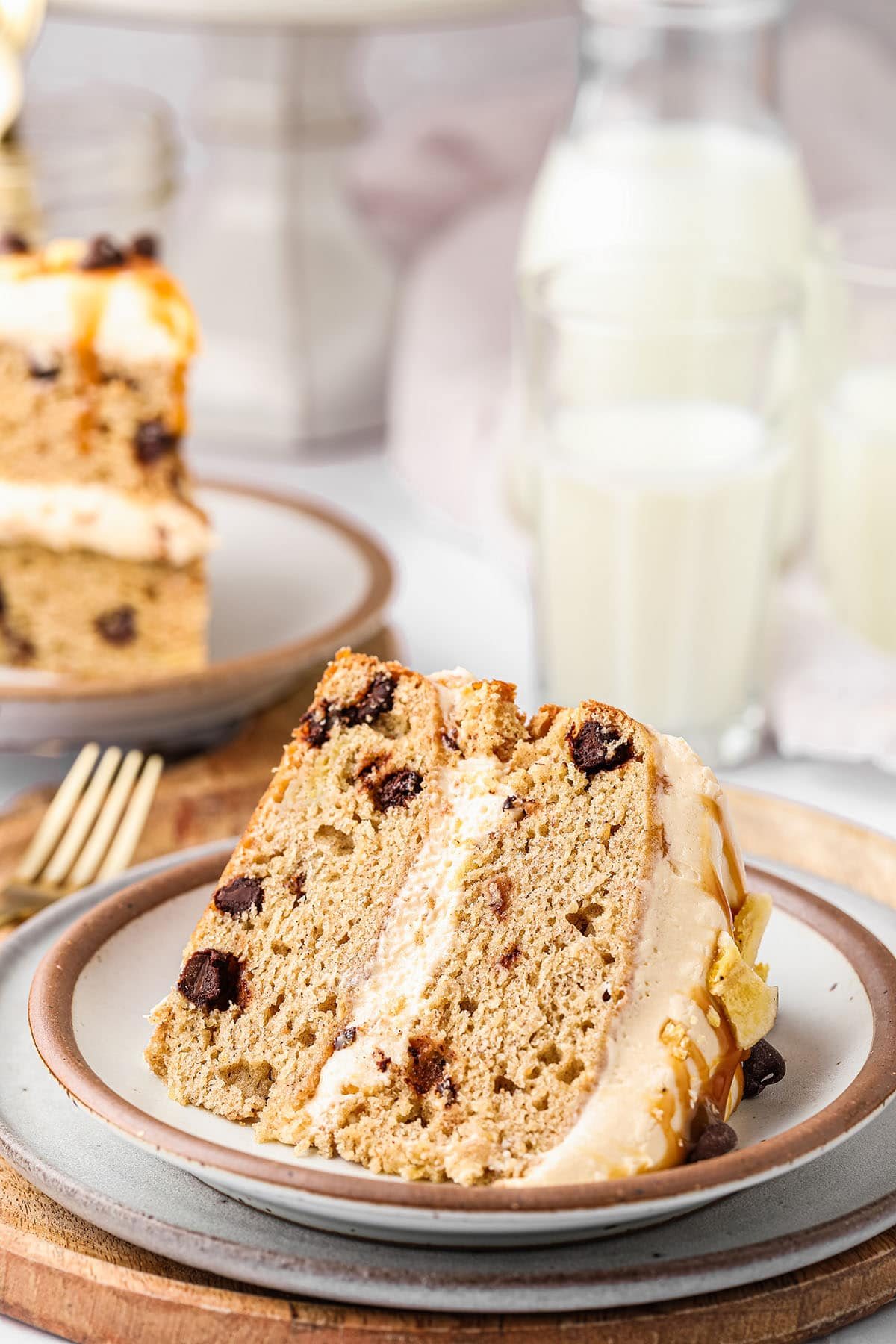 sliced of chocolate chip banana cake with frosting