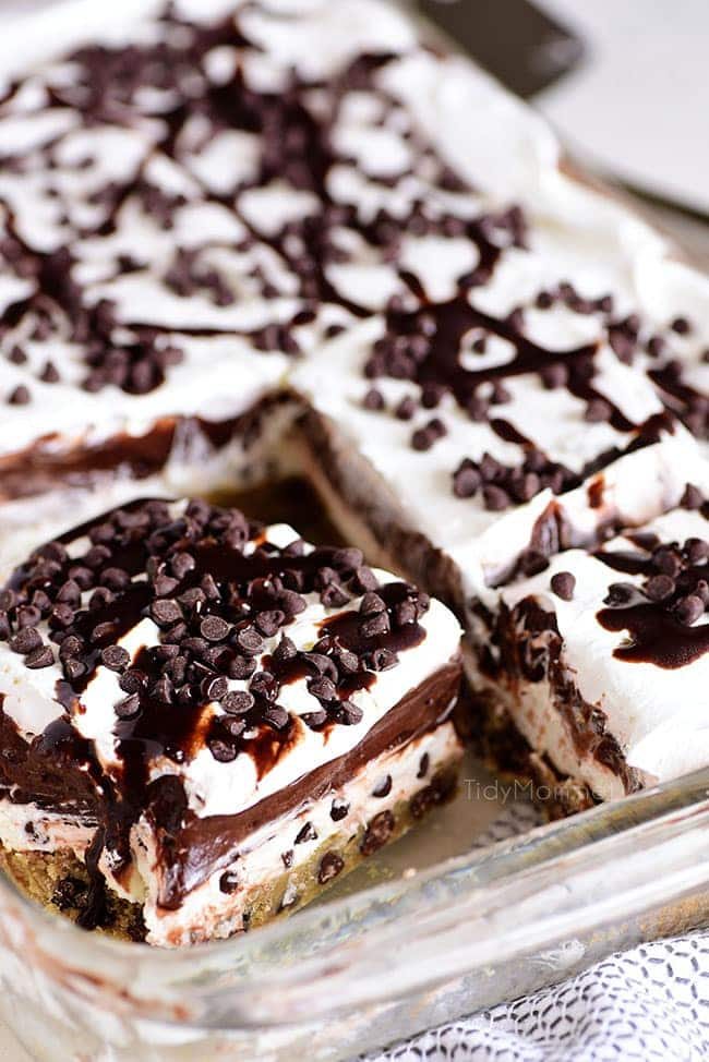 Chocolate Chip Cookie Layered Delight piece cut in baking dish