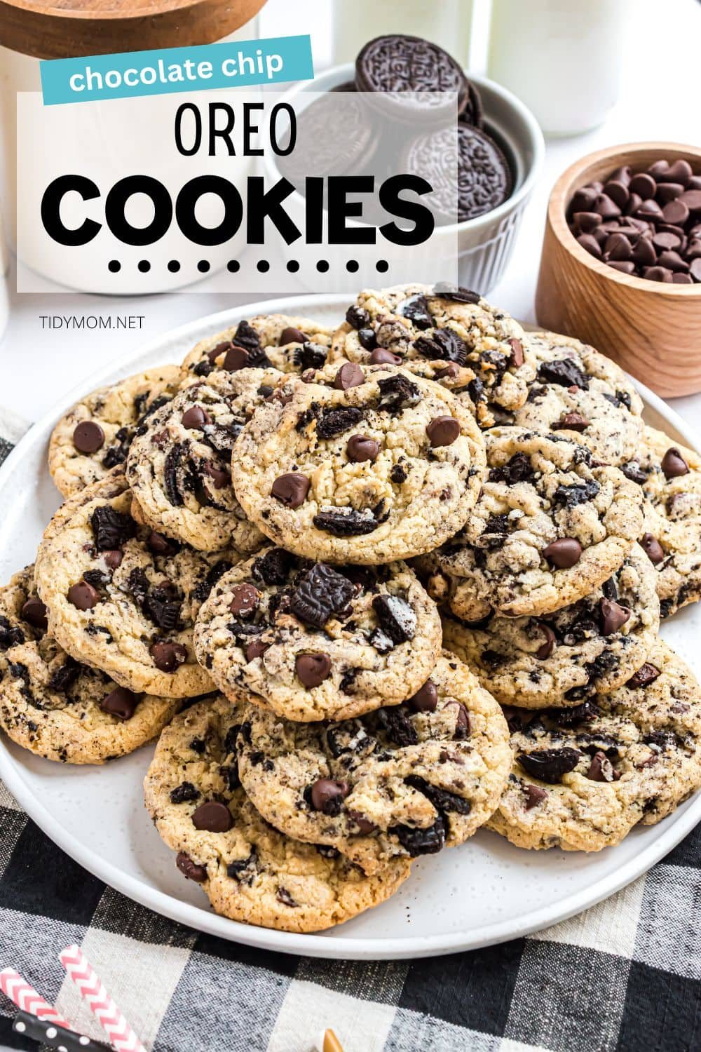 pile of Chocolate chip Oreo filled cookies on a white platter