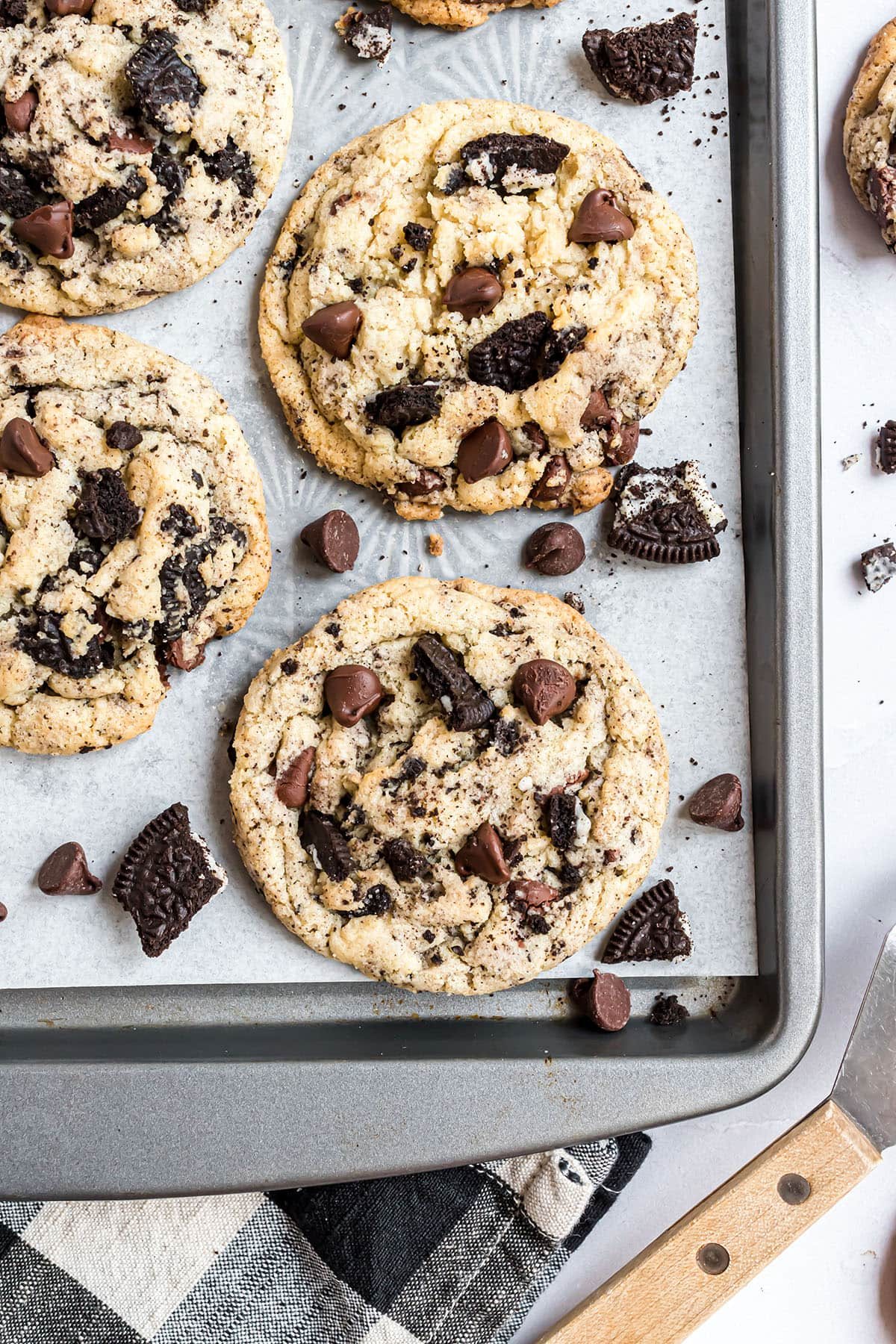 Chocolate chip Oreo cookies on a baking sheet