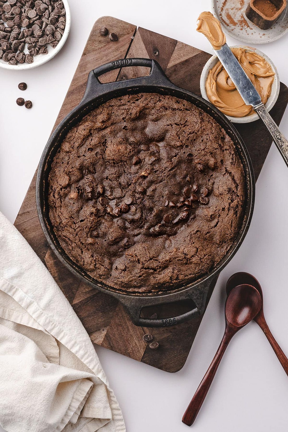 Overhead view of baked chocolate cobbler in a skillet
