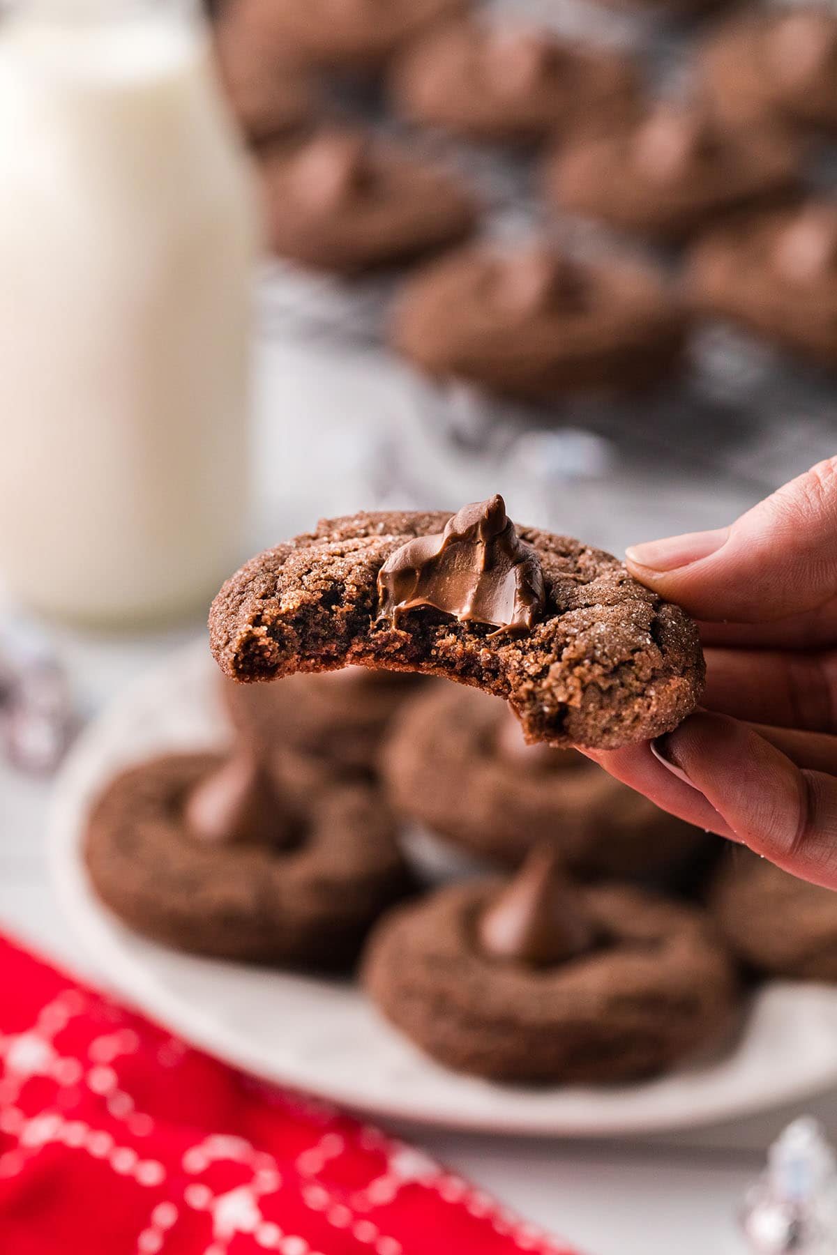 chocolate kiss cookie with a bite out