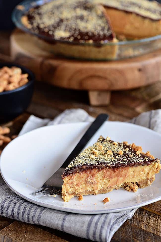 Dessert doesn't get any better than this ultra-rich Chocolate Peanut Butter Pie with layers of graham cracker, peanut butter filling, and chocolate. It's pie perfection. Print full recipe at cetcu.com