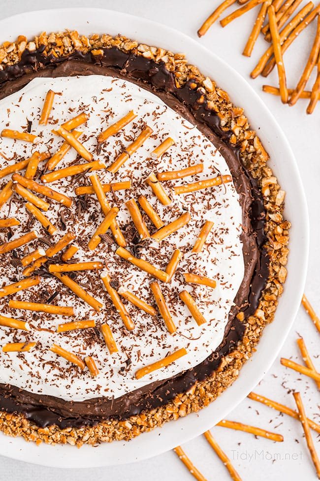 overhead shot of chocolate cream pie with pretzel crust in pie dish