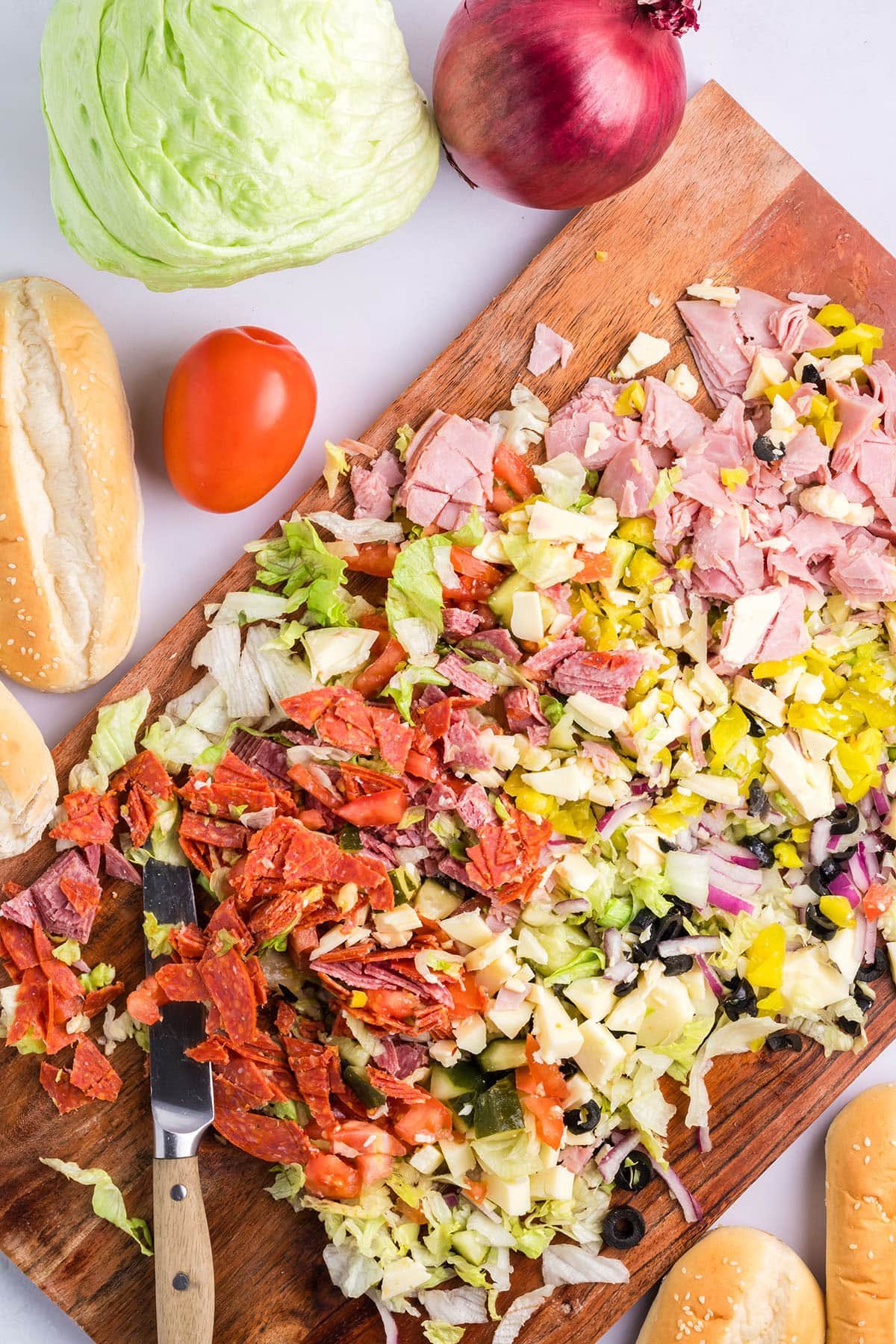 Chopped Italian Sandwich ingredients on a cutting board