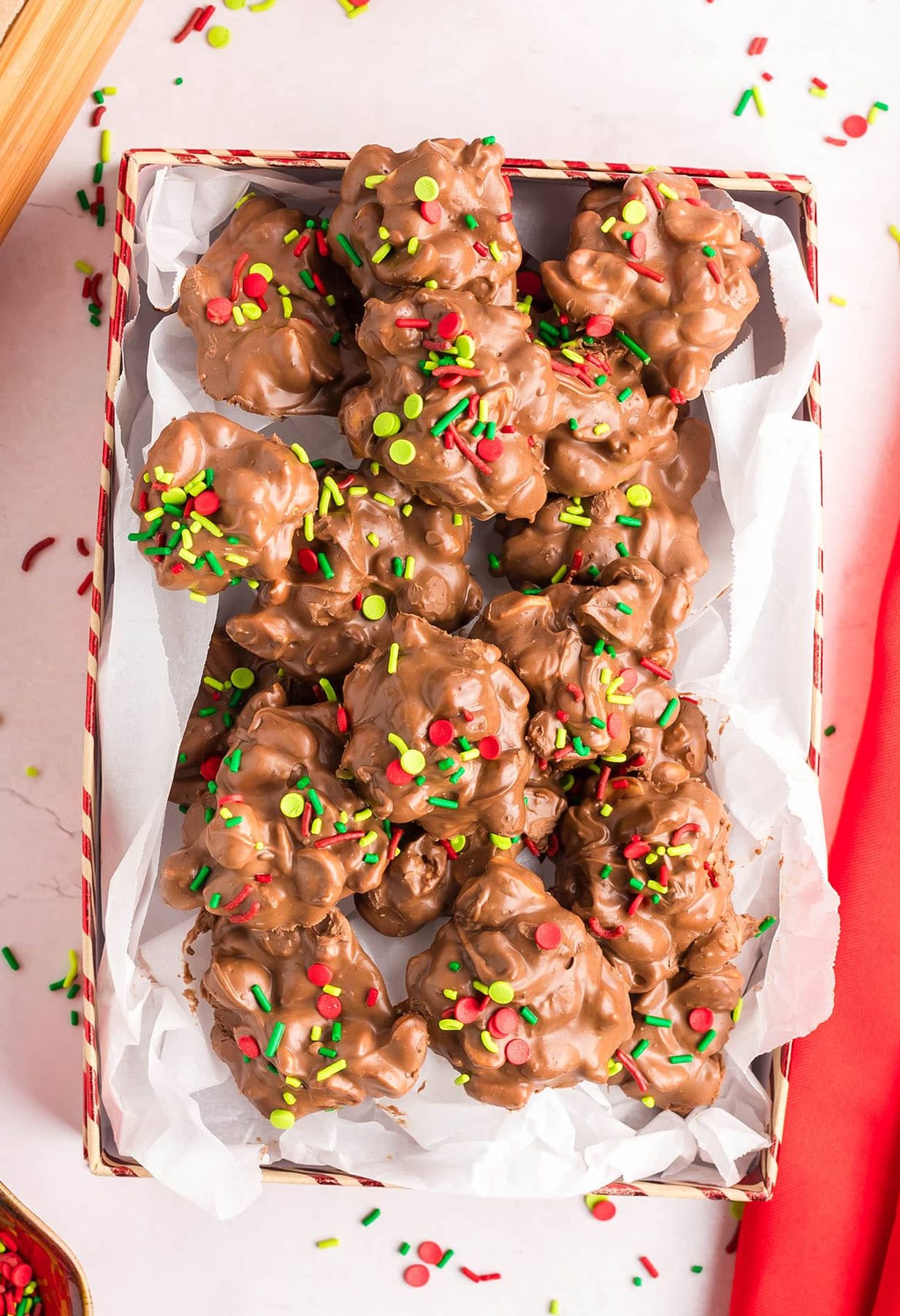Christmas crockpot candy with festive sprinkles