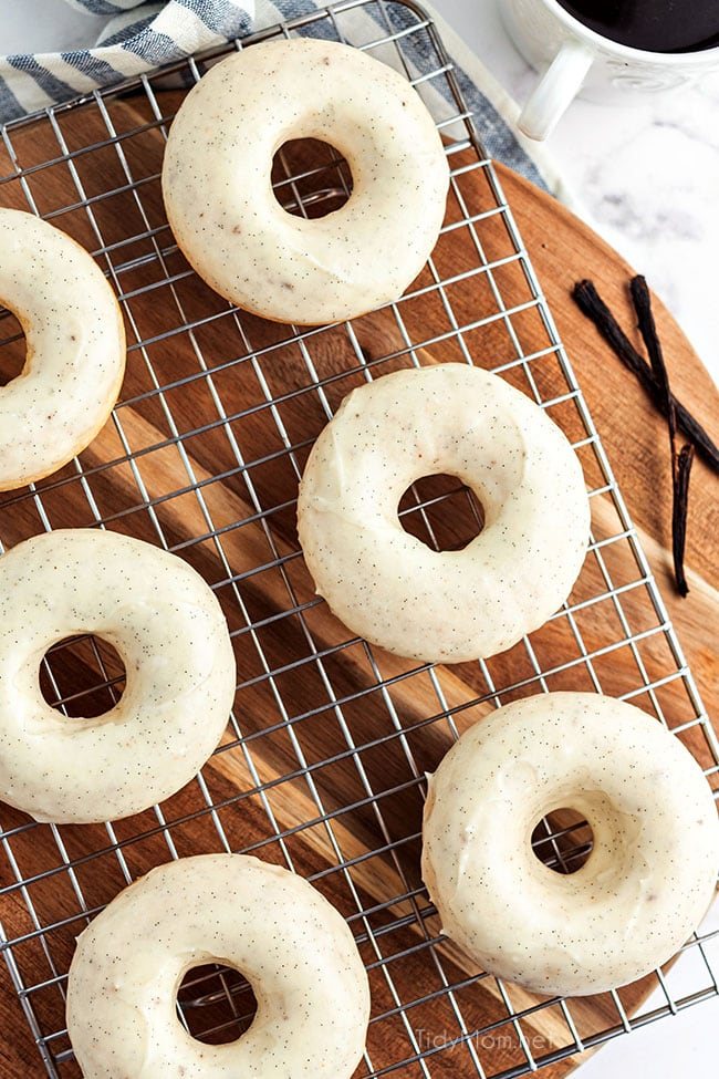 glazed cinnamon donuts on a cooling rack