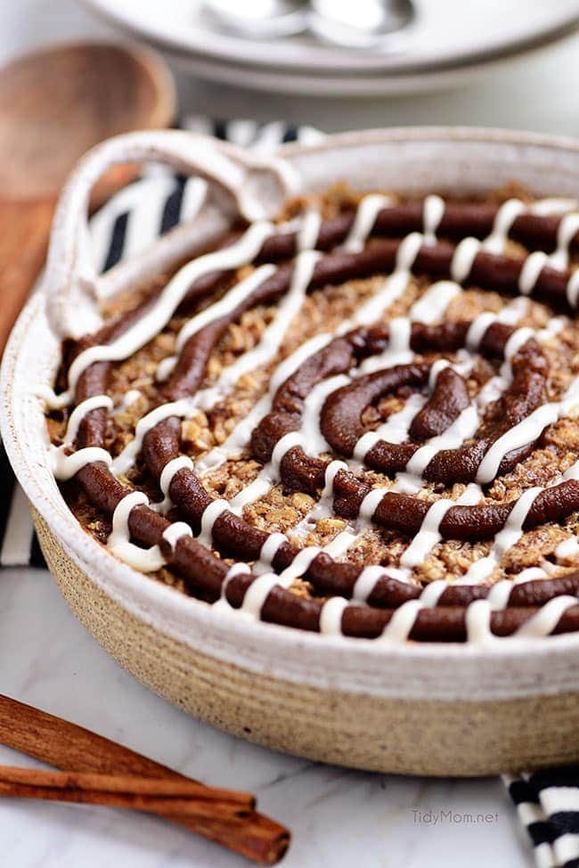 Cinnamon Roll Baked Oatmeal in round dish