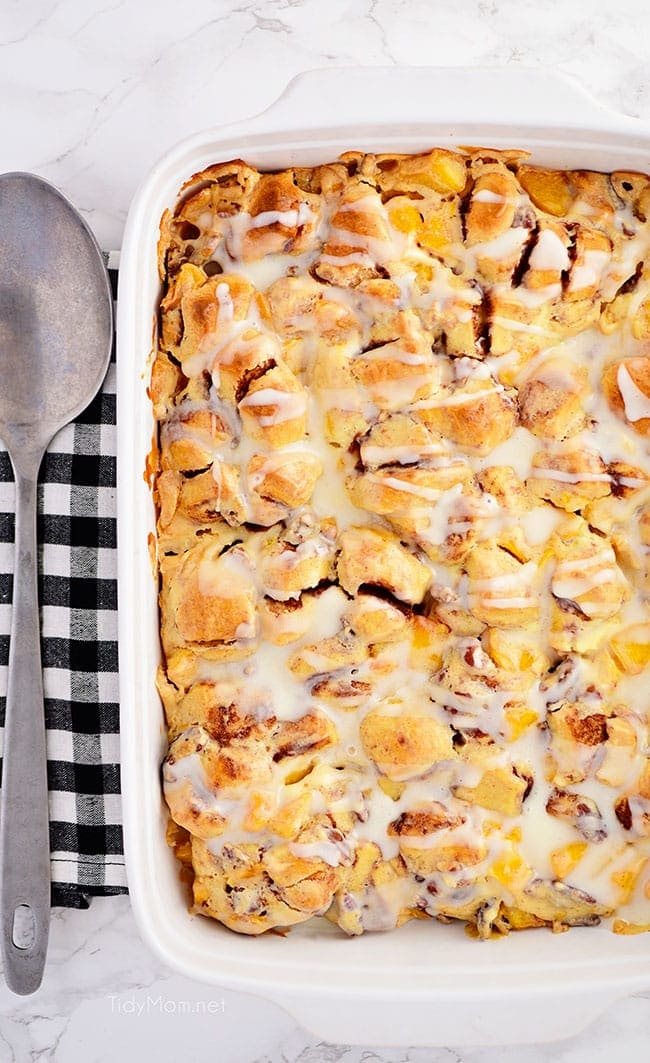 Cinnamon Roll Peach Cobbler in a casserole pan