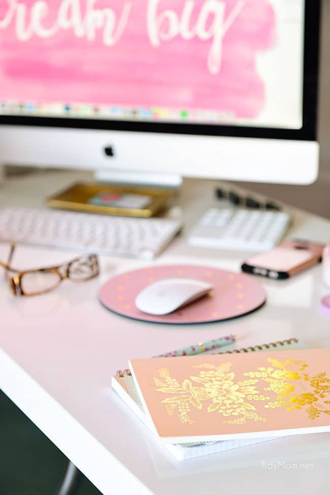Decorating a shared office, with colorful industrial style. Her side is pink and gold, while his is black and neutrals. Check out the gold coffee cart!! Get all the details of this shared home office space at cetcu.com