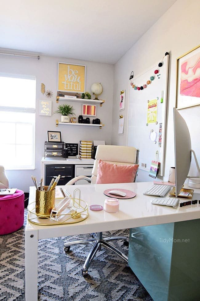 Decorating a shared office, with colorful industrial style. Her side is pink and gold, while his is black and neutrals. Check out the gold coffee cart!! Get all the details of this shared home office space at cetcu.com