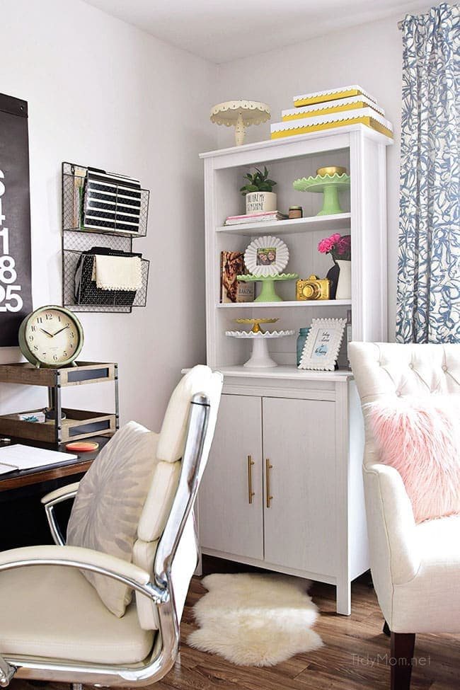 Decorating a shared office, with colorful industrial style. Her side is pink and gold, while his is black and neutrals. Check out the gold coffee cart!! Get all the details of this shared home office space at cetcu.com