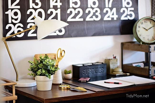 Decorating a shared office, with colorful industrial style. Her side is pink and gold, while his is black and neutrals. Check out the gold coffee cart!! Get all the details of this shared home office space at cetcu.com