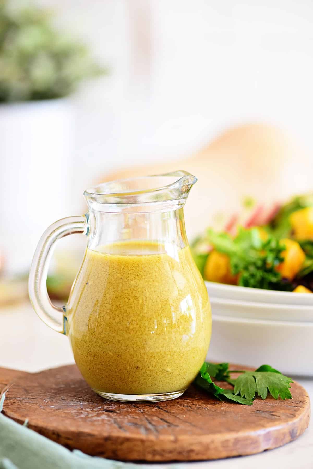 Maple dijon vinaigrette in a glass cruet